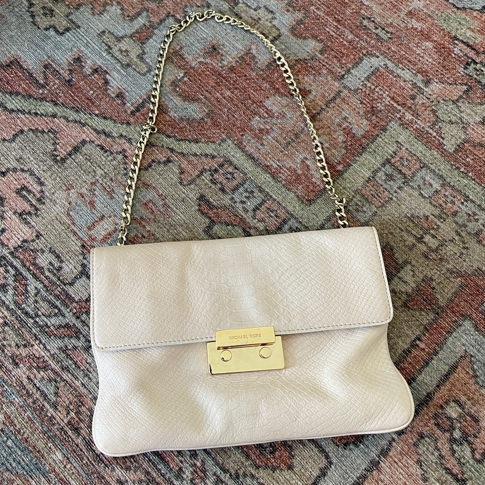 Cream Michael Kors leather handbag with gold hardware, gently used condition.